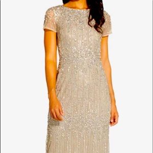 Adrianna Papell. Beaded Short Sleeve
Long Gown In Silver
Silver / Regular